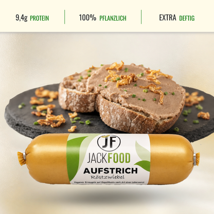 Im Headerbereich sind die Angaben zum Proteingehalt, 100% pflanzlich und einen usp Punkt. Im Bild im oberen Bereich ist der vegane Brotaufstrich mit Röstzwiebel auf eine Scheibe Brot gestrichen und darunter das Produkt in seiner Originalverpackung.